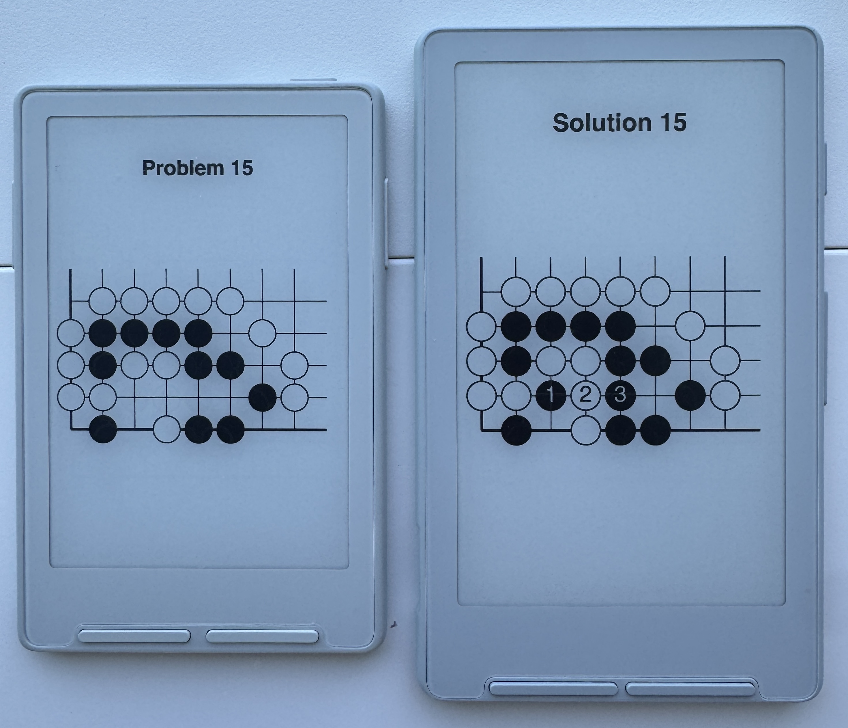 Go problem books running on a white Xteink X3 and X4